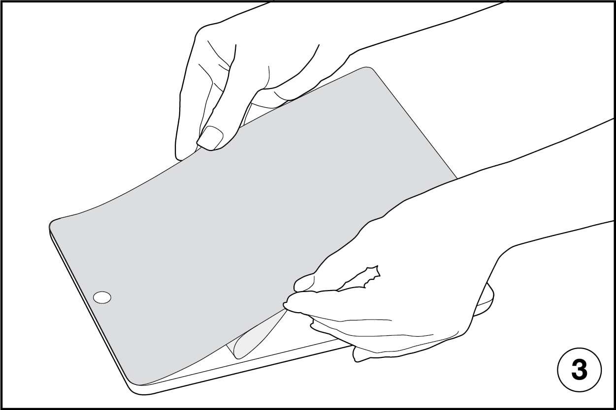 Illustration showing how to slowly apply screen protector to tablet